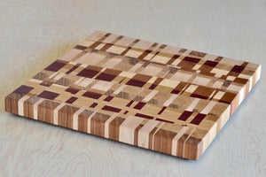Medium Cutting Board by Chris Karlson Design is a Chock-A-Block Cutting Board made with end grain hard woods and is as good as a chopping block as it is a serving board.