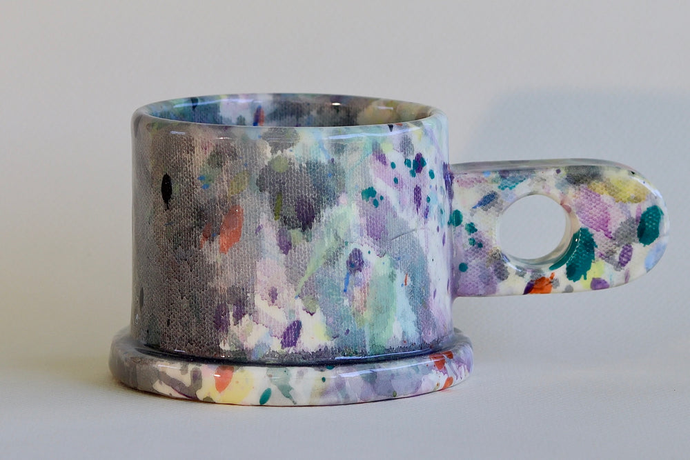 Gray, Lilac and Blue EXP splatter mug available at OK.