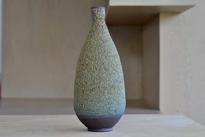 Heather Rosenman Tall Green Vase in Volcanic glaze.