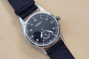 38MM Standard Issue Field Watch by Cameron Weiss. Black Dial and manually wound with American parts, hands and markers.