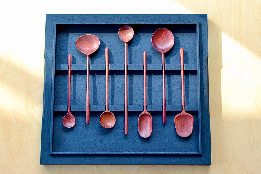 Box set of seven handcarved spoons. A box set of seven hand carved wooden spoons. Originally created for Central Restaurant in Lima, Peru, these spoons, made from scraps of wood from the Amazon forest bridge the gap between ancient crafts and modern design, featuring a clean look with beautiful curves and slight grain variations to the wood. These are ment to be used. 
