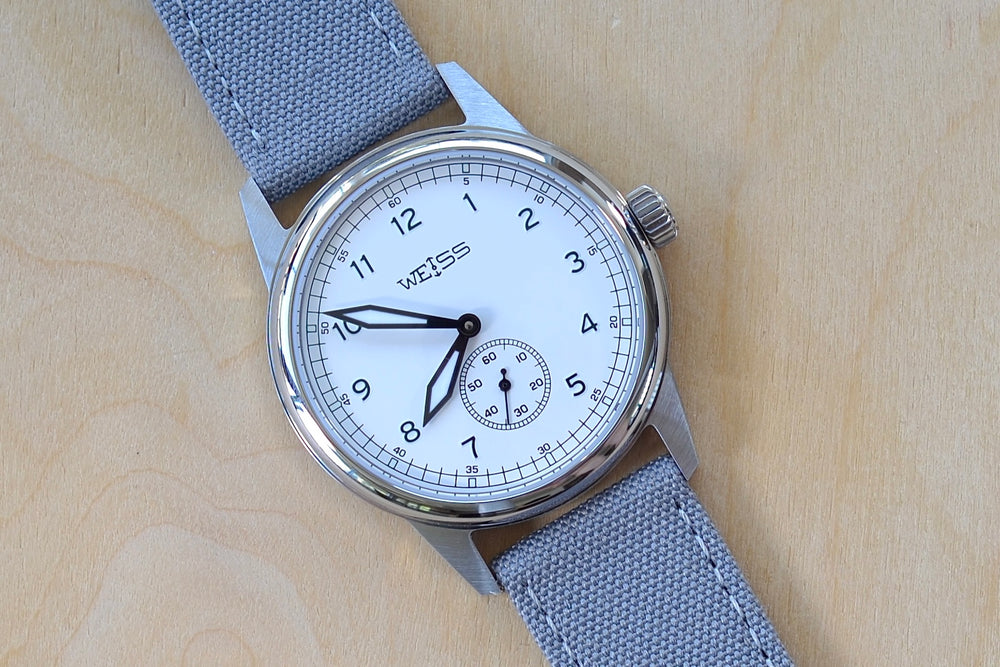 38MM Standard Issue Field Watch by Cameron Weiss. White Dial and manually wound with American parts, hands and markers.