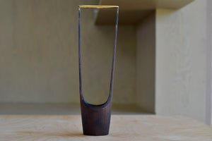 Aubock Vase with Ring 7228 is a  patina brass vase with polished edges and ring on top. Designed and handmade by Werkstätte Carl Aubock. OK has the largest selection of current Werkstätte Auböck production in the US and in stock, ready to ship.