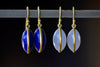 Large Moon Earrings by Tej Kothari are cabachon stones set in 18k gold on earwire. Lapis and Chalcedony. 