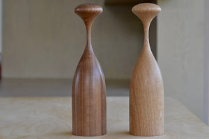 Serratus Pepper Mill Grinders that twist in Black Walnut or White Oak. Ceramic crush grind mechanism that works with rock salt. Made in solid ethically sourced wood in Canada. Designed by Tantalus Design.