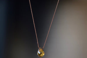 Cognac Quartz Zen Gem designed by Margaret Solow is an Individual translucent and faceted brown Cognac quartz gem on string makes this one of a kind organic pendant necklace. Designed by Margaret Solow. Handcrafted in Los Angeles.