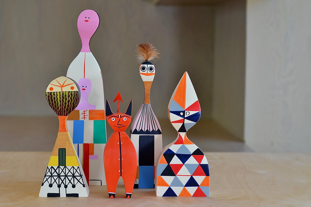 Menagerie of Alexander Girard doll collection figurines.