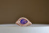 Sapphire Pear cut ring with Halo by Elizabeth Street Jewelry is a pear cut silky sapphire with a white diamond halo in rose gold.