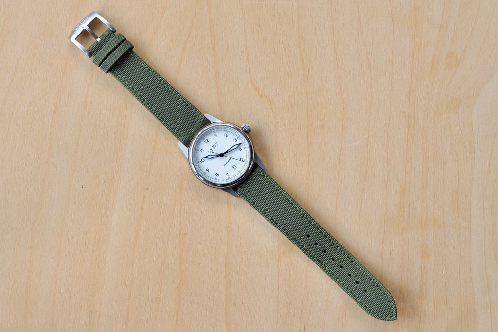Image of full Weiss watch, automatic with white dial and date.