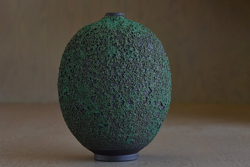 Alternate view of Heather Rosenman Tall Oval and Deep forest green ceramic  Vase in volcanic glaze.