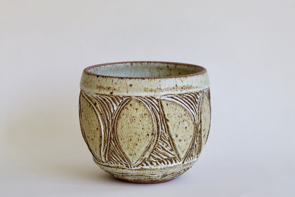 A cream and ceramic one of a kind Irving Place Studio (IPS) Vase made by Dora De Larios (1933-2018)