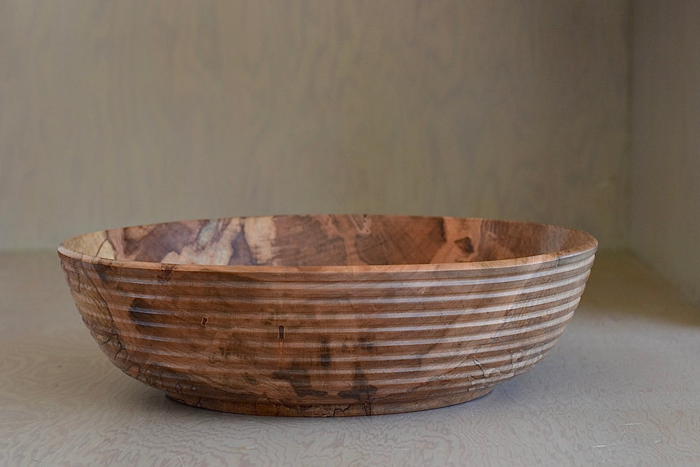 Other side of Circle Factory Bowl in Maple with ridges, a turned wood bowl in natural Maple by George Peterson.