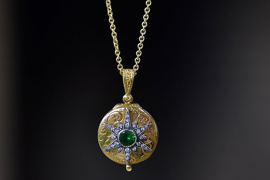 Close up of Arman Sakysian Star Locket with Green Emerald.