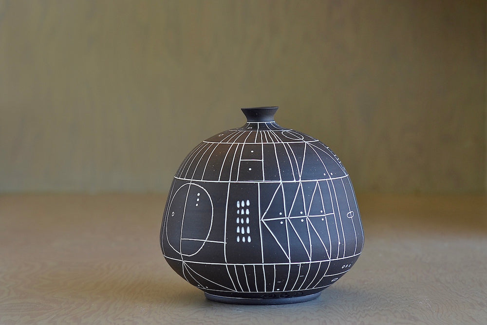 Alternate side of The HR 400 'Scribe" vase is a ceramic  hand thrown stoneware vase with sgraffito patterns by Heather Rosenman. 