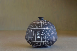 Alternate side of The HR 400 'Scribe" vase is a ceramic  hand thrown stoneware vase with sgraffito patterns by Heather Rosenman. 