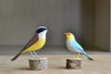 Selection of wooden and hand carved birds from Brazil, showing Great Kiskadee and Red Beak.