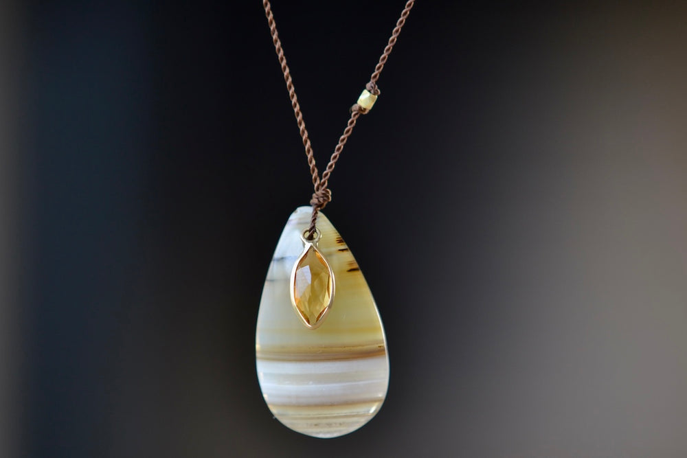 Close up of Agate and Citrine Pendant Necklace.