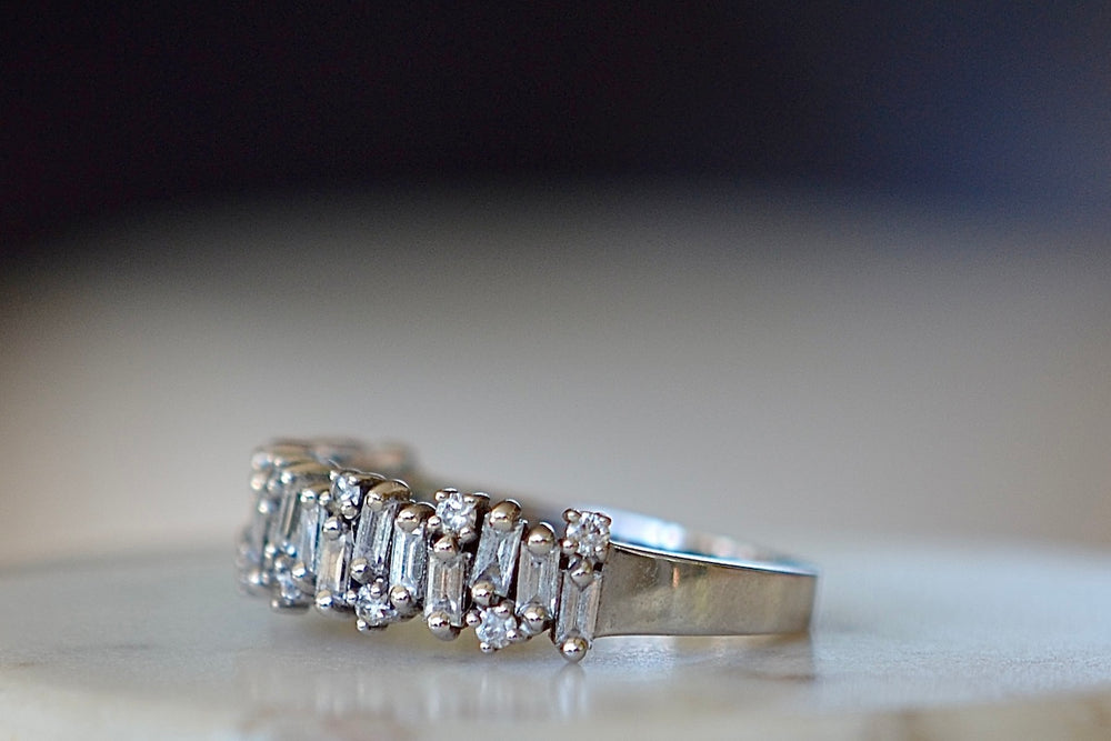 Side view of the The Alternating Diamond Half Eternity Band.