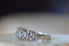 Side view of the The Alternating Diamond Half Eternity Band.