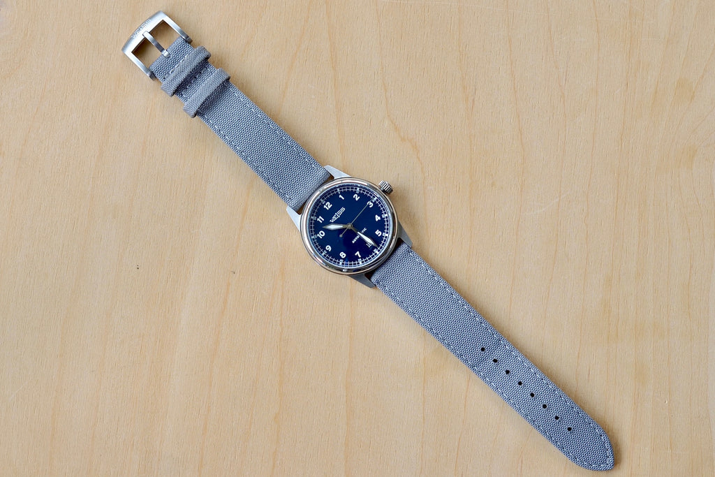 Full image of 38mm Automatic Issue Field Watch with Blue Dial and Date and Gray Canvas band.