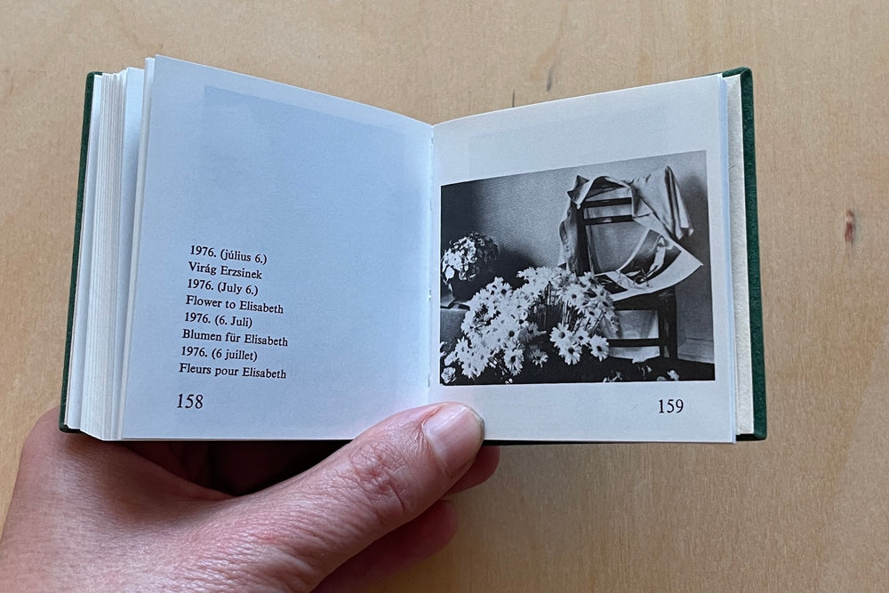 Image from A rare and out of print Andre Kertesz miniature photo book bound in green velvet with gilt lettering that was published by  Szentendre in 1987 with text in Hungarian, German, English and French.