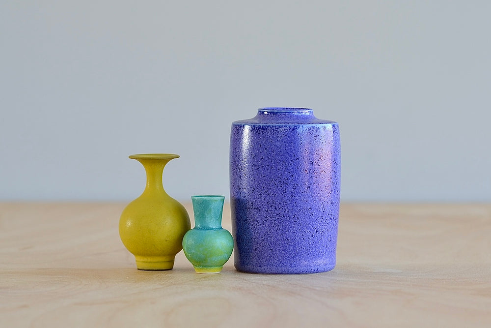 Miniature Hand Thrown Ceramic Vase Trio by Yuta Segawa in Purple, Jade Green and Yellow on white background.