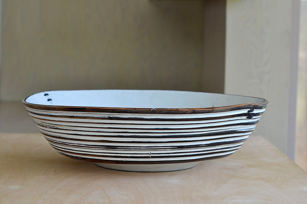 Alternate view of Circle Factory turned wood bowl in black and white with ridged grooves and stitch detailing by George Peterson.