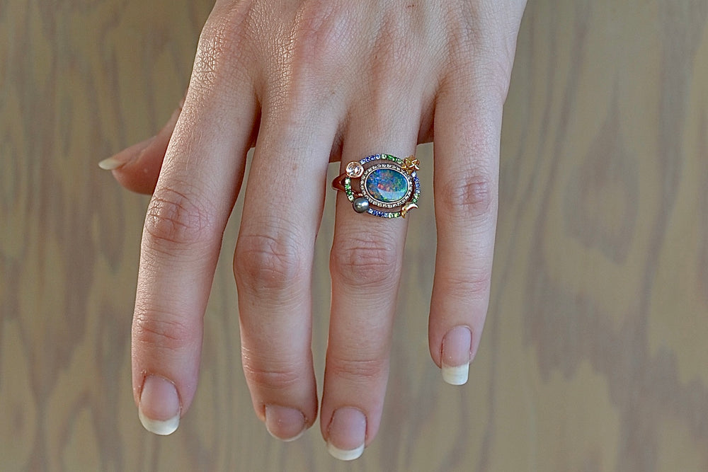 Wearing the Small Galaxy Opal Ring by Bibi Van Der Velden. 