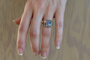 Wearing the Small Galaxy Opal Ring by Bibi Van Der Velden. 
