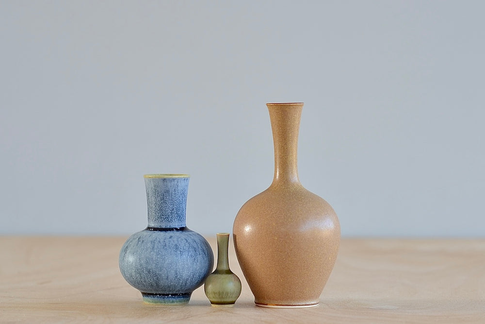 Miniature Hand Thrown Ceramic Vase Trio by Yuta Segawa in Brown, Gray and Green on white background.