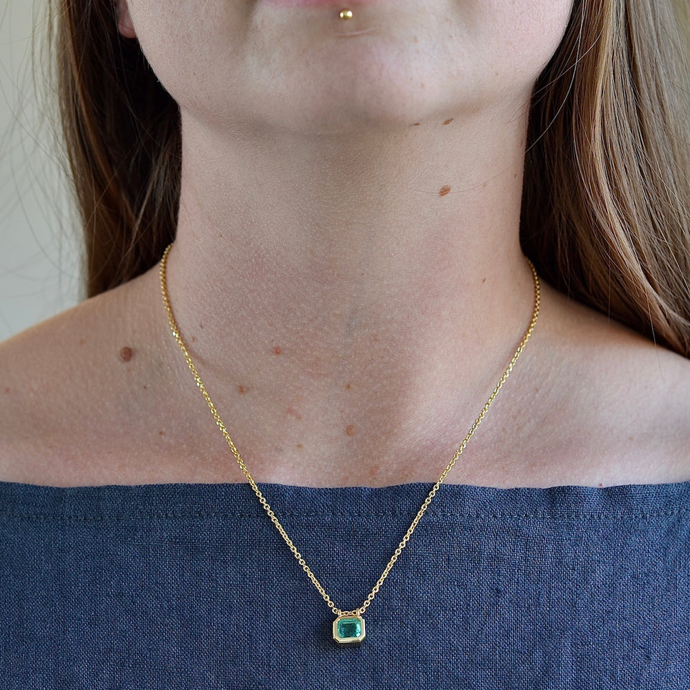 Wearing the Duo Bale Emerald Necklace by Elizabeth Street Jewelry.