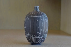 One more of Hand thrown dark brown clay vase with white  sgraffito "Scribe series" by Heather Rosenman.