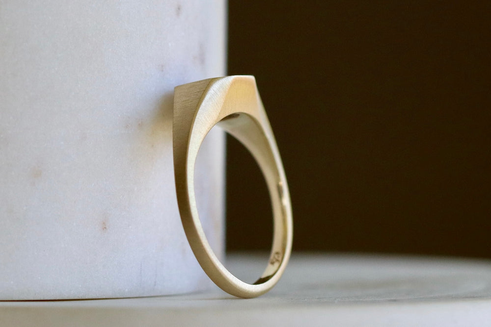 Shaped band on Ceylon Sapphire Signet by Elizabeth Street Jewelry. 