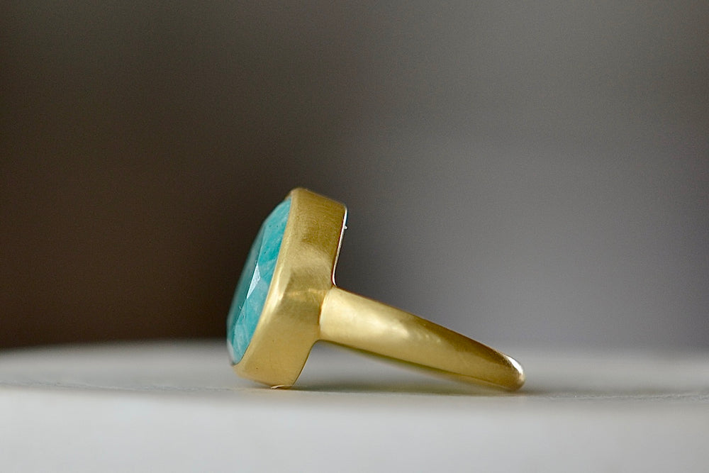 Side view of Large Greek ring in Amazonite by Pippa Small Jewellery is an organically shaped, hand cut and faceted amzonite set in 18k.