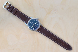 Full view of Weiss Watch 38mm Automatic Issue Field Watch with Navy Blue Dial and date, shown with dark brown Horween Leather strap. This watch is made with American parts, featuring Super Luminova hands and markers. 