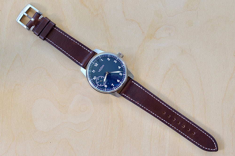 Full image of Weiss Watch 42mm Standard Field Watch with Navy Blue Dial, shown with brown Horween leather strap is manually wound, made with American parts, featuring Super Luminova hands and markers.