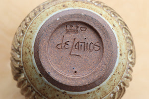Dora de Larios signature on brown ceramic IPS Irving Place Studio vase.