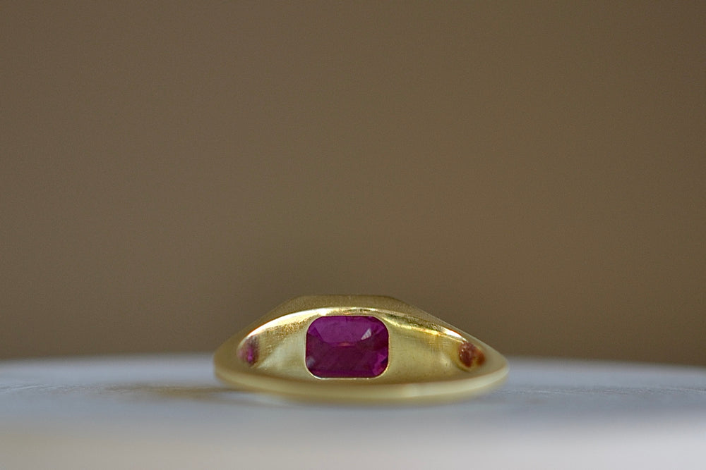 Alternate view of Ruby Signet by Elizabeth Street in size 7 with tapered matte 18k gold band.