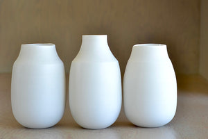 Three different vases with neck by Lilith Rocket in porcelain.