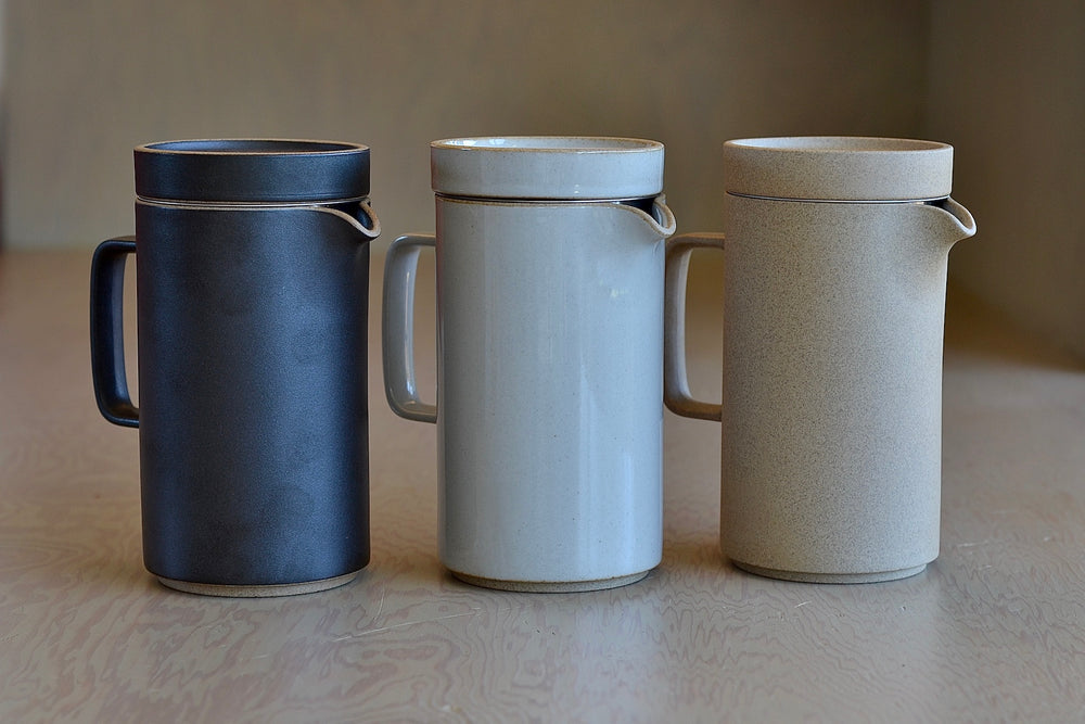 Showing the black, gray and natural tall teapots by Hasami.