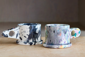 Black and Gray and Gray, Lilac and blue splatter mugs.