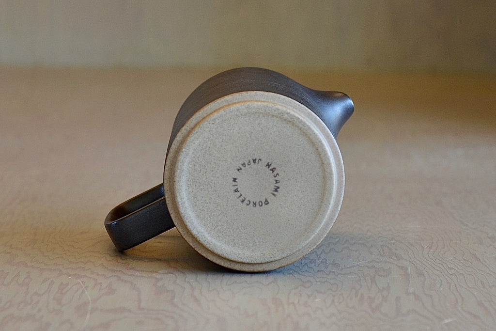 Showing the bottom on the Hasami tall porcelain teapot in black. Made in Japan.