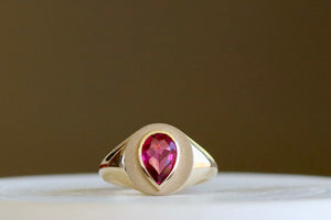 Alternate angle on Circle Signet with Pear Tourmaline by Elizabeth Street Jewelry.