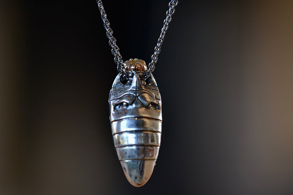 Alternate view of Scarab Star Necklace by Bibi Van Der Velden is a pendant necklace of a scarab in 18k rose gold and sterling with a sterling chain, white diamonds,  brown diamonds, a  scarab wing in amethyst with pink sapphire and tsavorite.