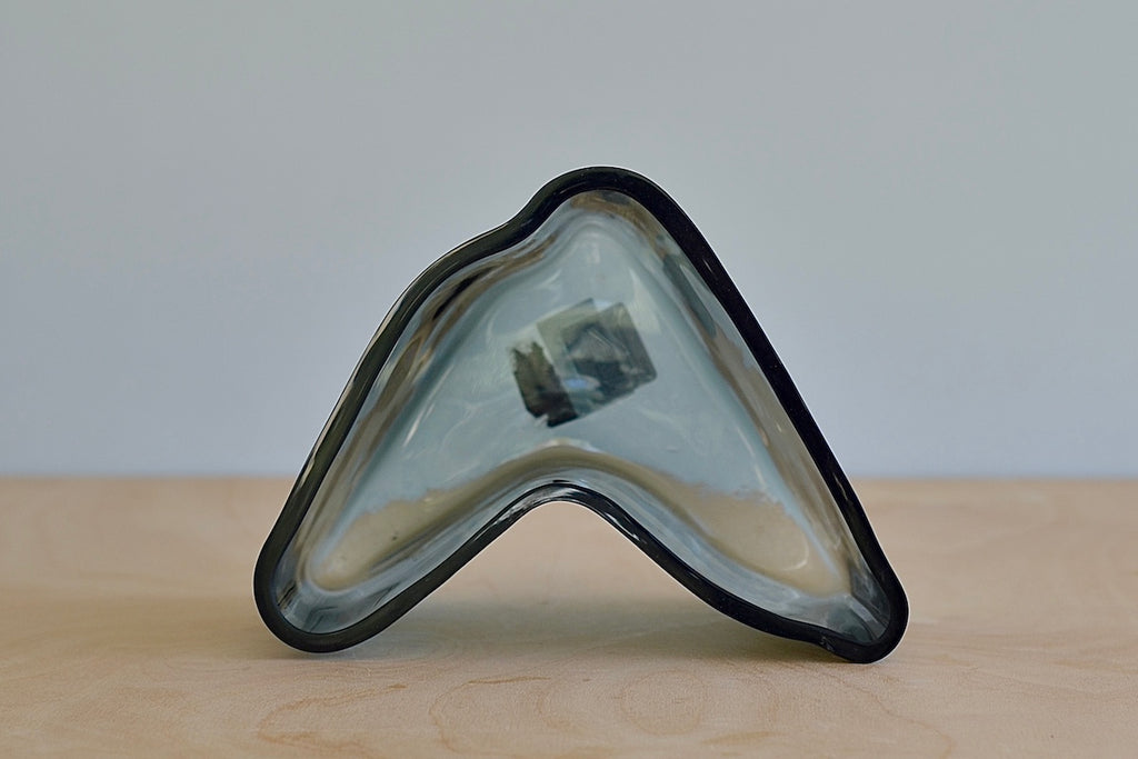 Boomerang vase shape.