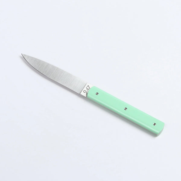9.47 Steak Knife by Perceval in pistachio green on white background.