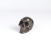 Bronze Object "Skull" by Anne Ricketts.