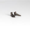 Bronze Objecs Pair of feet "Standing Still" is a sculpture of a pair of feet cast in bronze with patina handmade and designed by Anne Ricketts.