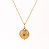 Mini Lace Locket by Arman Sarkisyan is a miniature scale locket in 22k gold with a blue sapphire center stone and lace like edging with white diamond accents hangs on a beautiful 18k gold chain. Detailed engraving on the back of locket which opens. Handmade in California.