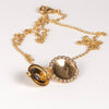 Showing the Mini Lace locket with blue sapphire open.
